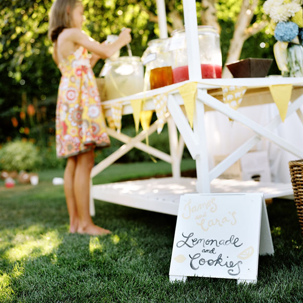  of country charm with mason jars, wildflowers, and a hand-painted sign.